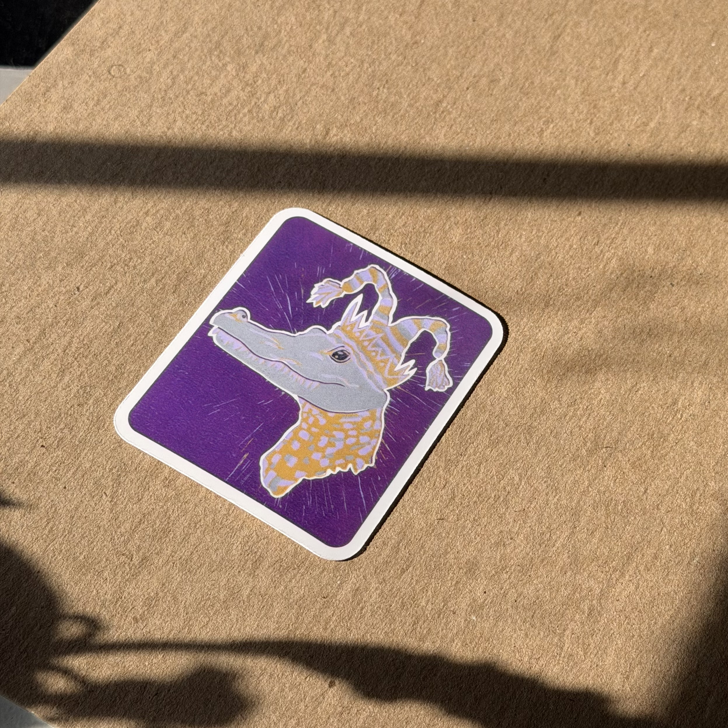 Mardi Gator Reduction Linocut Artwork Sticker